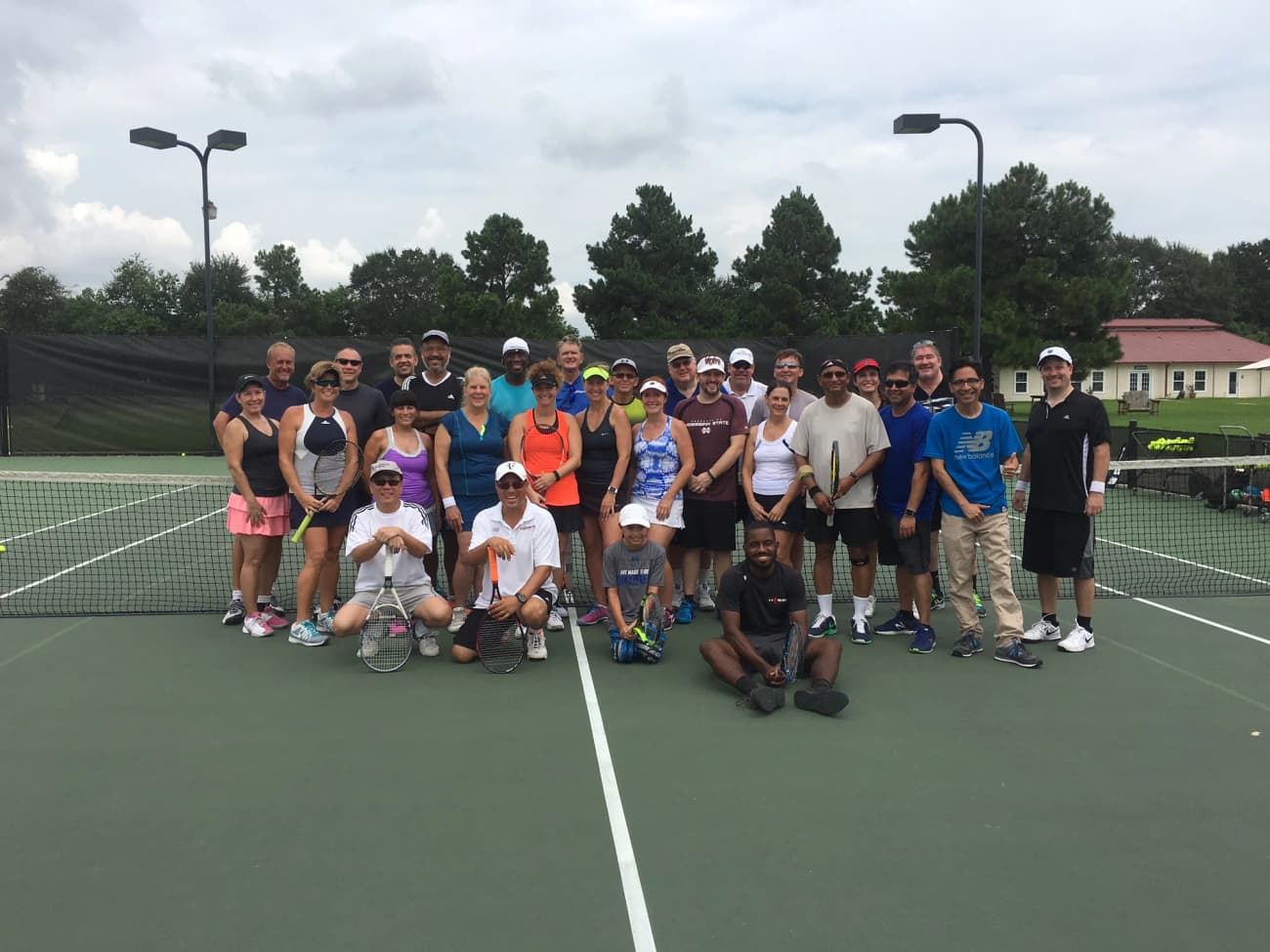 The adult group on court at the King's Court fall kick-off.